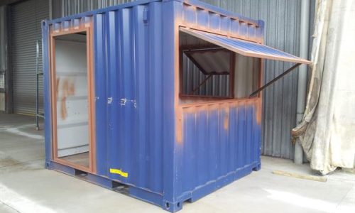 Blue 10ft shipping container kiosk with serving window and doorway