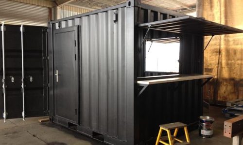 Black 10ft shipping container kiosk with serving hatch and access door