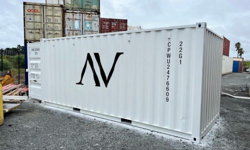White shipping container branded with AV