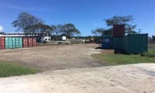 Betham Brothers Ltd storage yard with shipping containers.