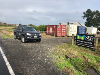 Shipping containers stacked at New Plymouth depot.
